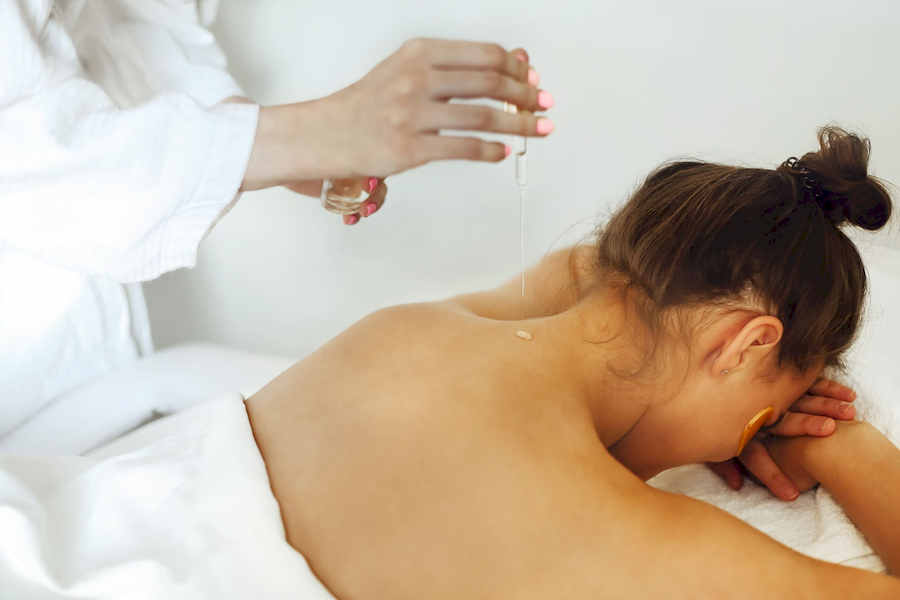 woman-on-massage-table-in-salon-2026-01-07-00-15-53-utc-scaled
